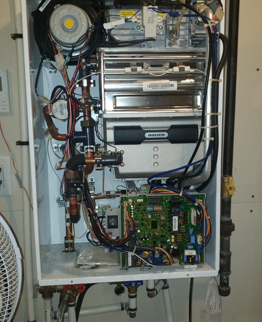 Flush Tankless Water Heater — Why & When? - Plumbing Paramedics - Plumbing Experts Calgary - Featured Image