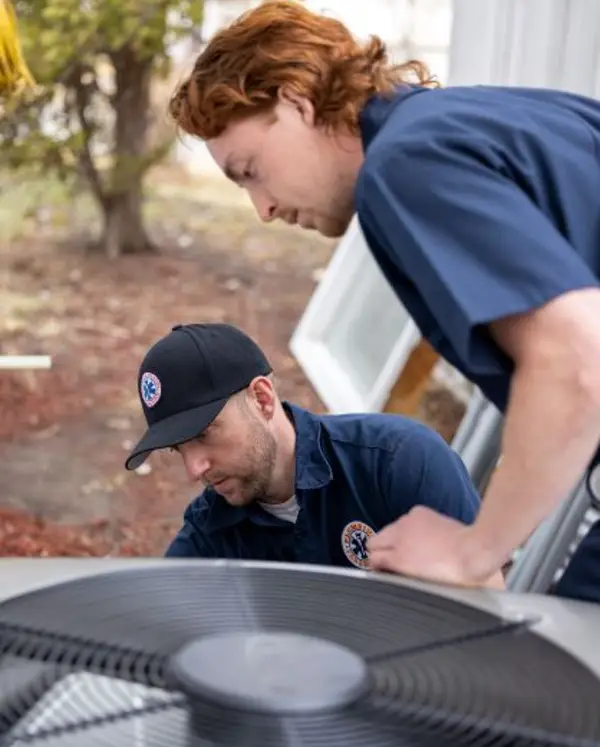 service team performing air conditioning repair in calgary